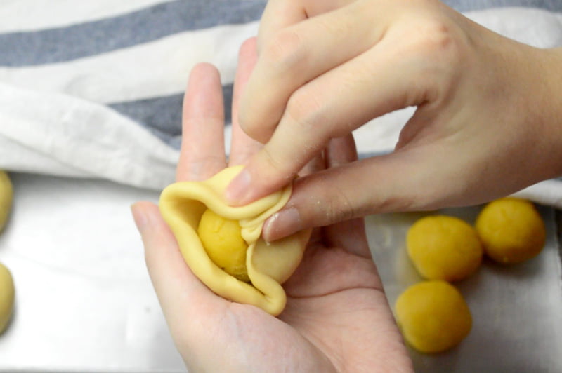 combining water dough and oil dough for making spiral curry puffs