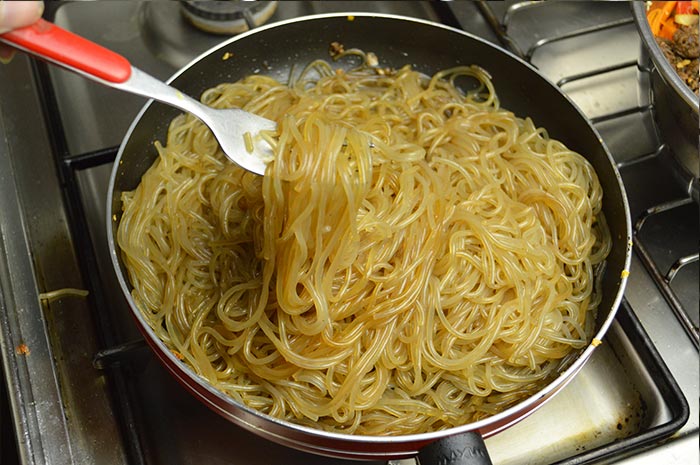 stir frying korean sweet potato starch noodles