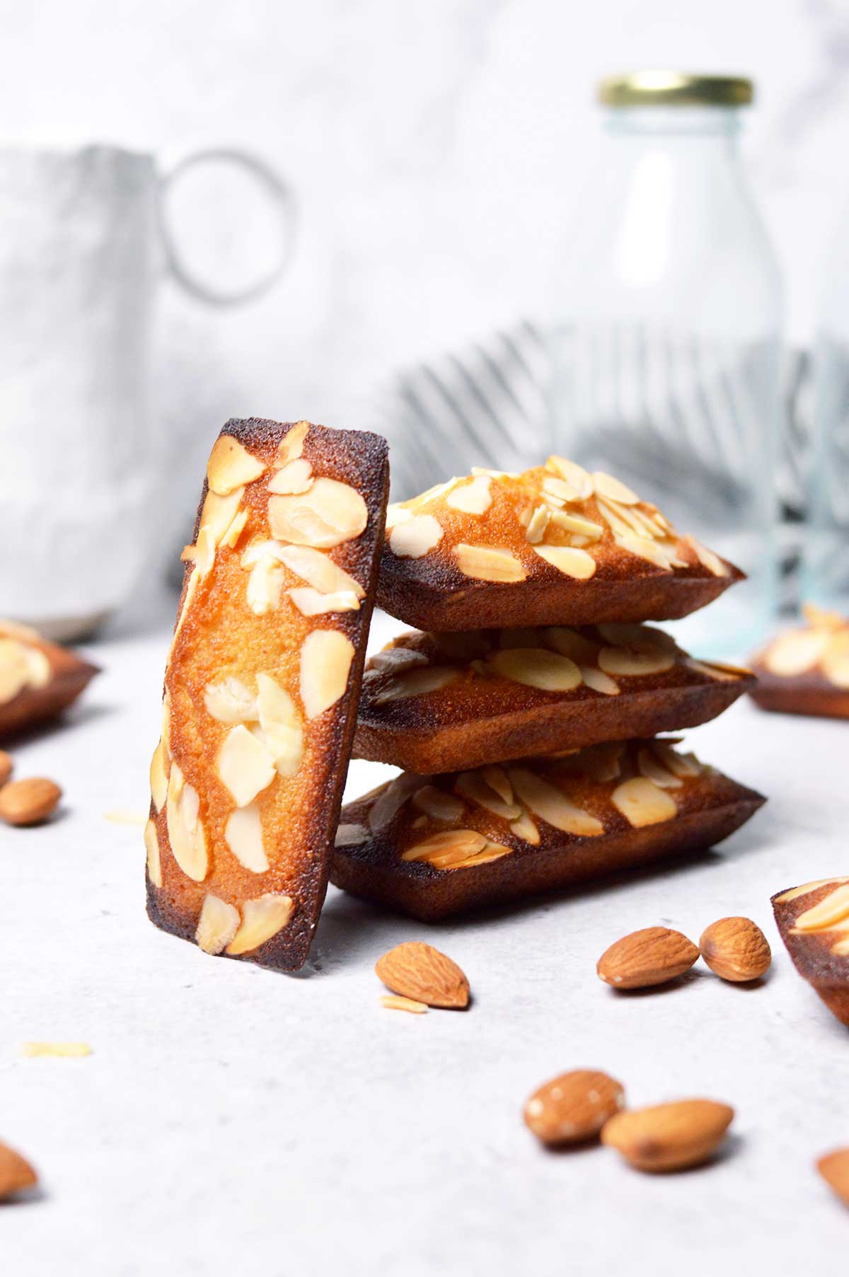 almond financiers with toasted slivered almonds on top