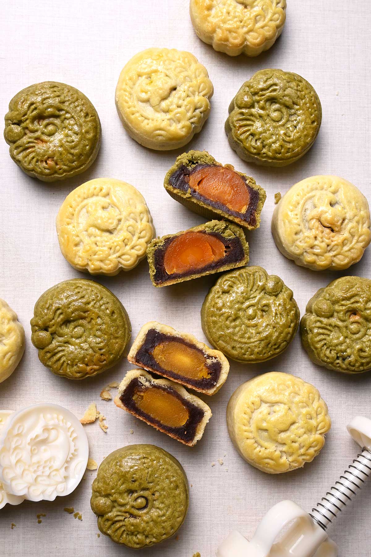 cookie crust mooncakes with red bean paste and salted egg yolk filling
