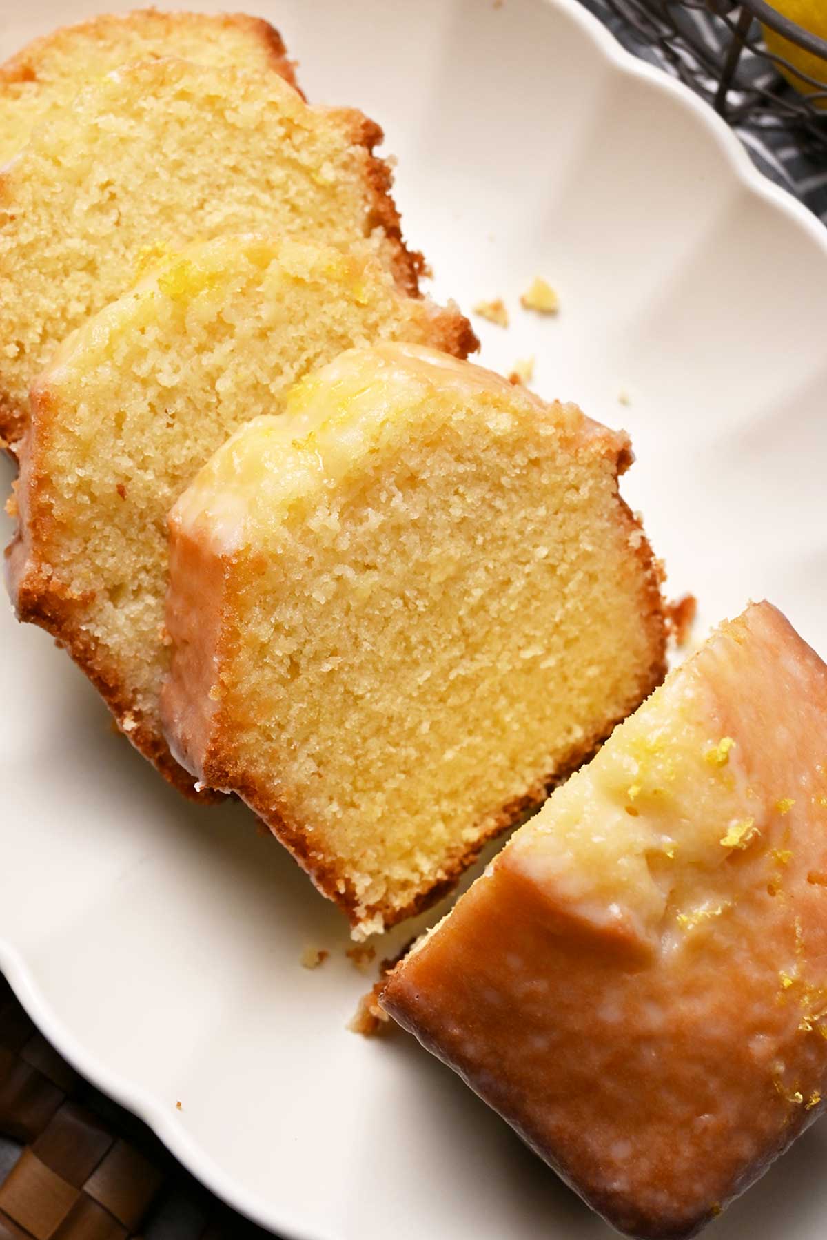 moist lemon pound cake soaked with syrup and topped with lemon glaze