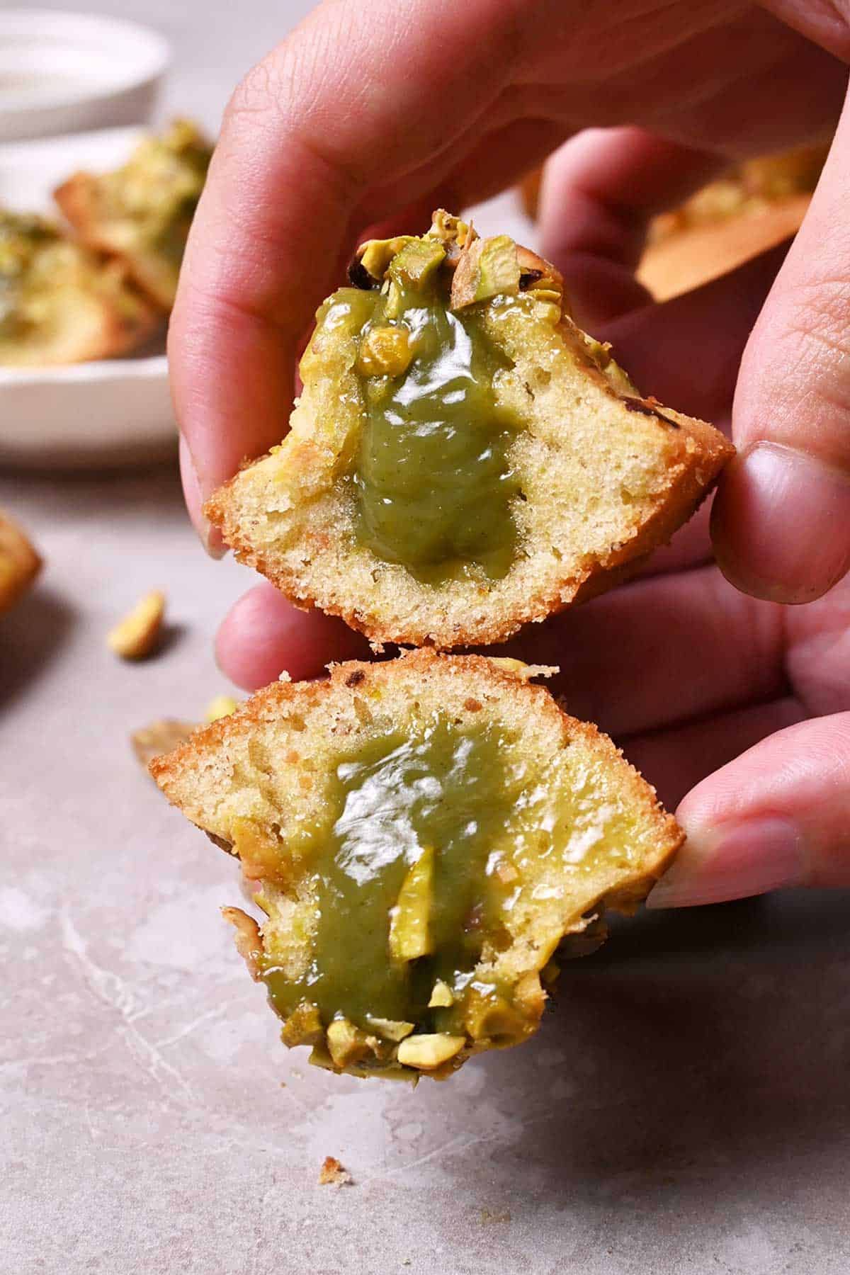 pistachio madeleines with pistachio white chocolate ganache filling