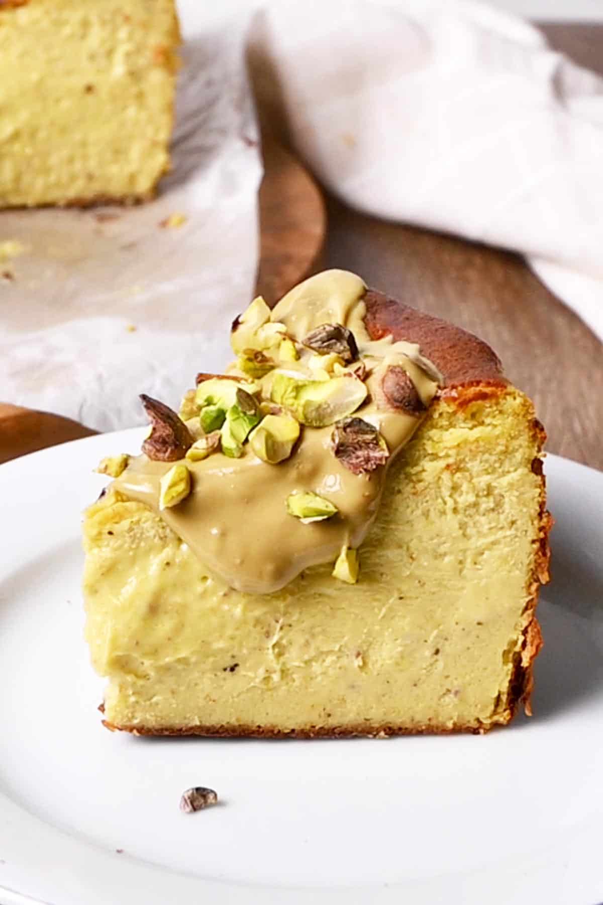 pistachio basque cheesecake with pistachio cream and roasted pistachios