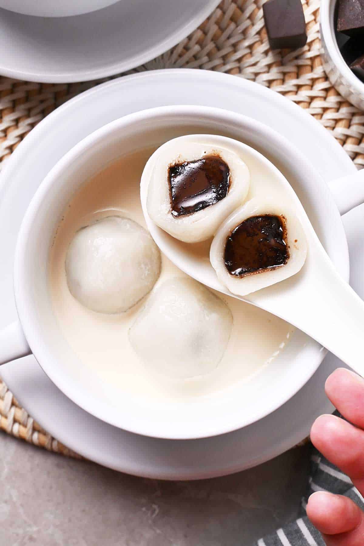 chocolate tang yuan (glutinous rice balls) in evaporated milk
